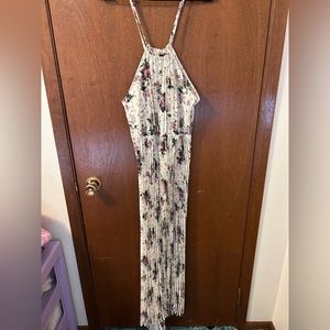 Pleated, floral, halter dress. Size M. Slit in front.